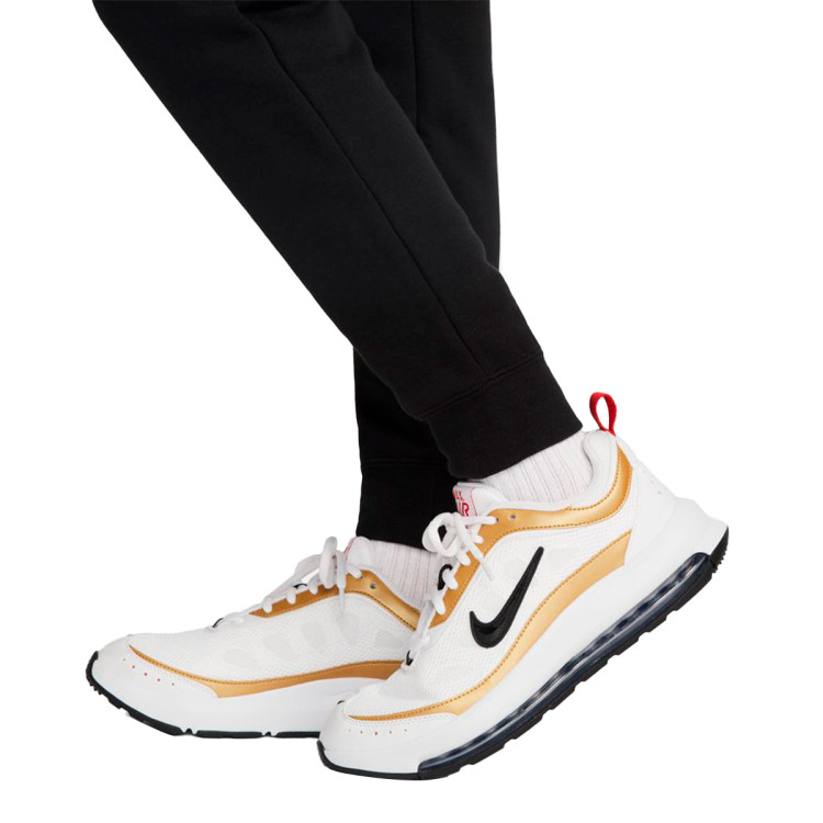 pantalon-largo-nike-sportswear-stardust-fleece-graphic-mujer-black-gold-3