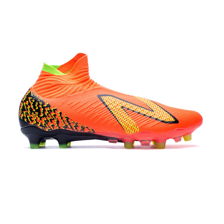 bota-new-balance-tekela-v4-pro-fg-coral-1.jpg