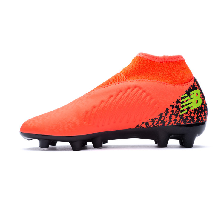 bota-new-balance-tekela-v4-magique-fg-nino-coral-2.jpg