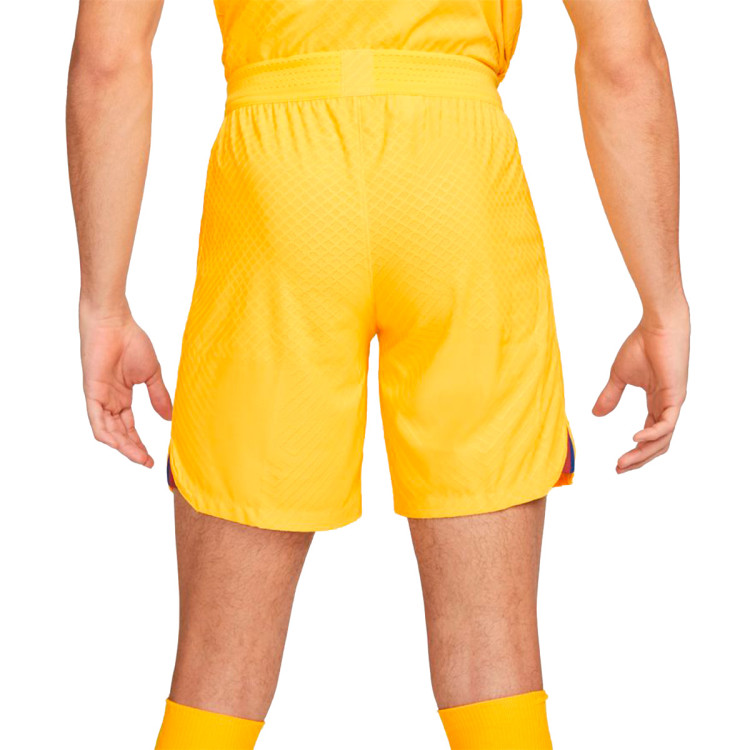 pantalon-corto-nike-fc-barcelona-cuarta-equipacion-stadium-2022-2023-yellow-deep-royal-blue-1.jpg
