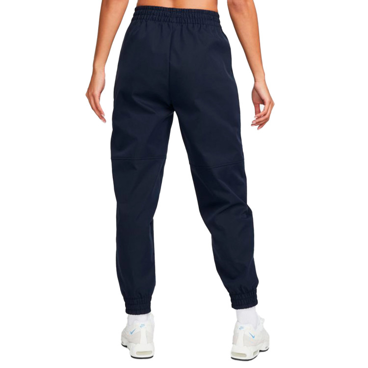 pantalon-largo-nike-fc-barcelona-fanswear-2022-2023-mujer-dark-obsidian-1.jpg
