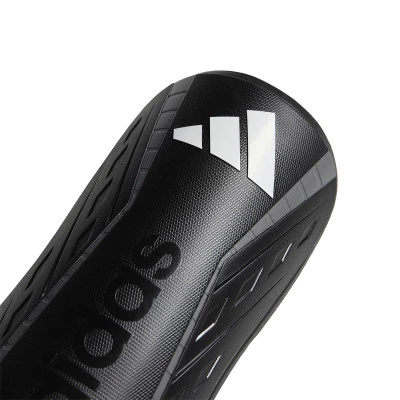 Espinillera Tiro League