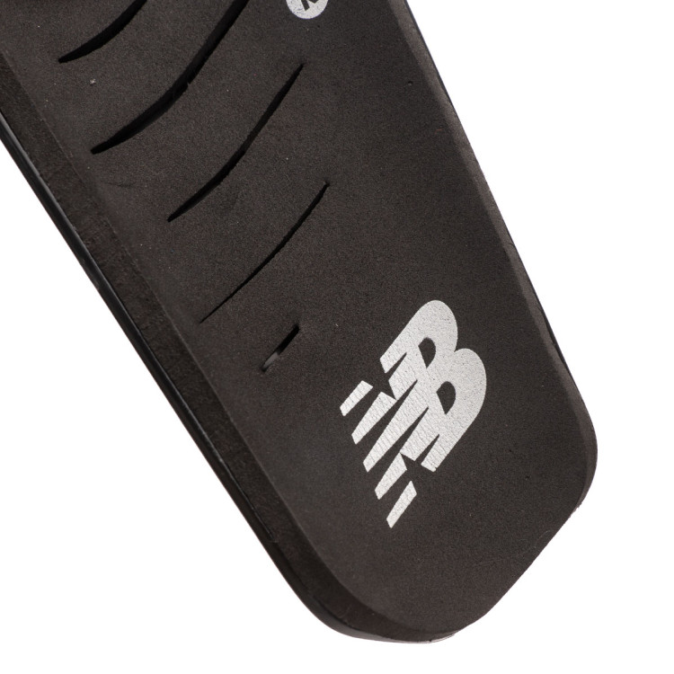 espinillera-new-balance-nclasp-flex-slip-guard-black-2.jpg
