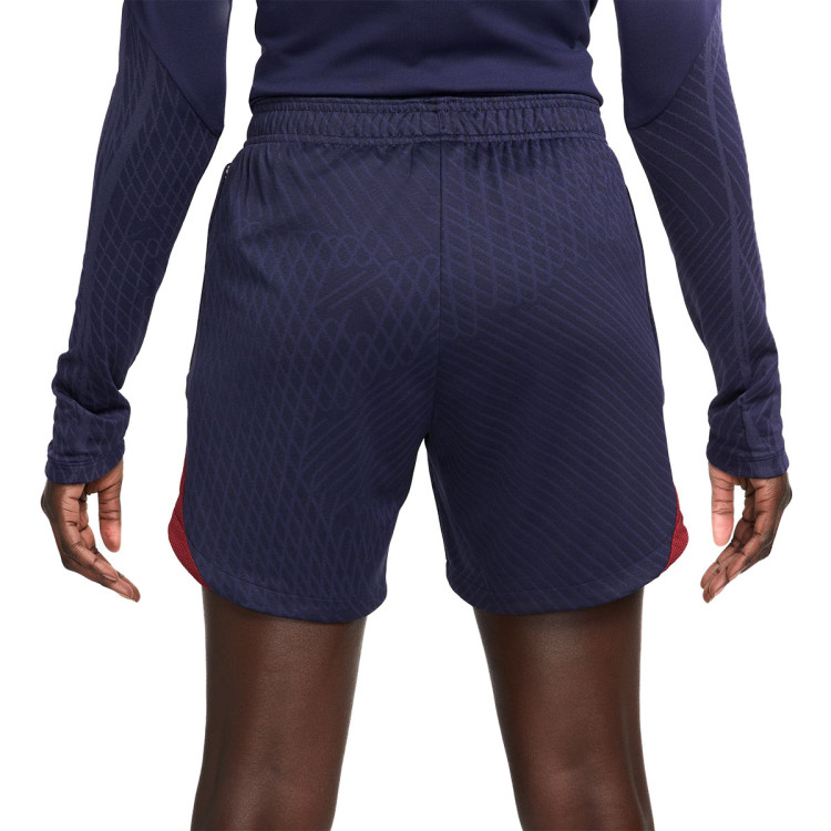 pantalon-corto-nike-paris-saint-germain-fc-training-2023-2024-mujer-blackened-blue-red-gold-1