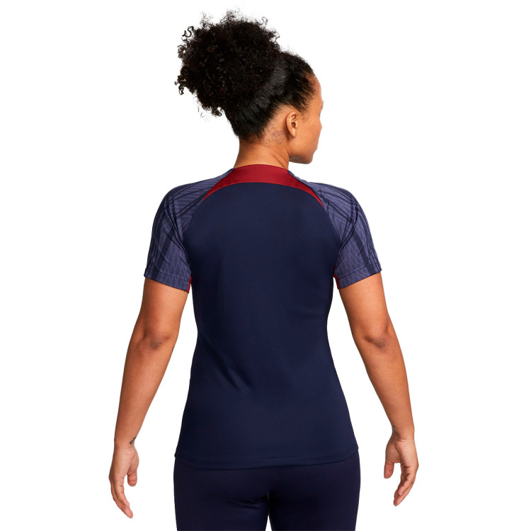 camiseta-nike-paris-saint-germain-fc-training-2023-2024-mujer-blackened-blue-red-gold-1.jpg