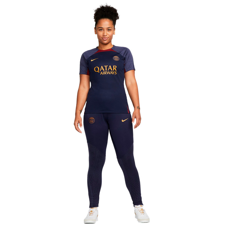 camiseta-nike-paris-saint-germain-fc-training-2023-2024-mujer-blackened-blue-red-gold-4.jpg