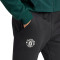 Długie spodnie adidas Manchester United FC Pre-Match 2023-2024