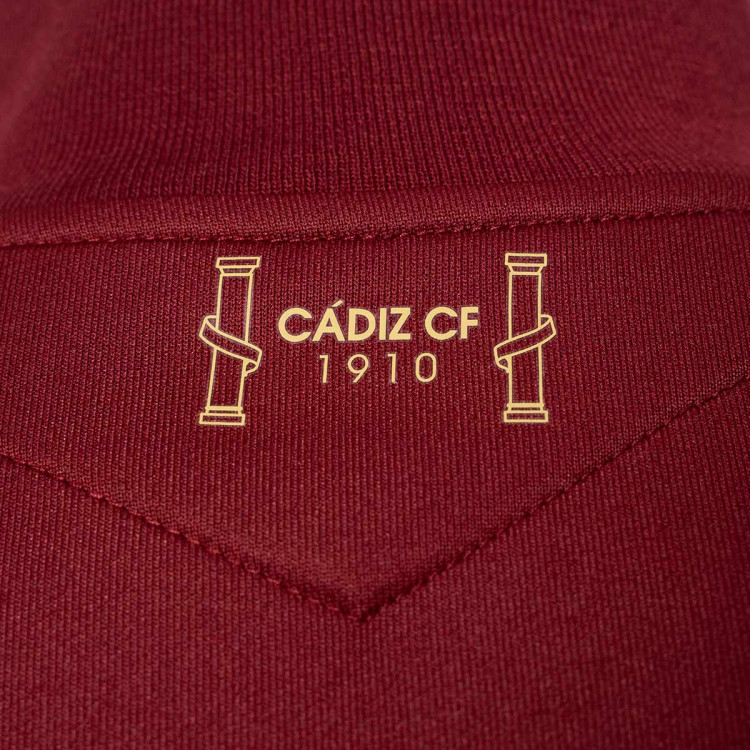 chaqueta-macron-cadiz-cf-fanswear-2023-2024-nino-granate-5.jpg