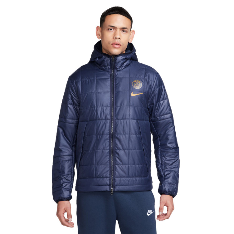 chaqueta-nike-paris-saint-germain-fc-fanswear-2023-2024-blackened-blue-gold-suede-0