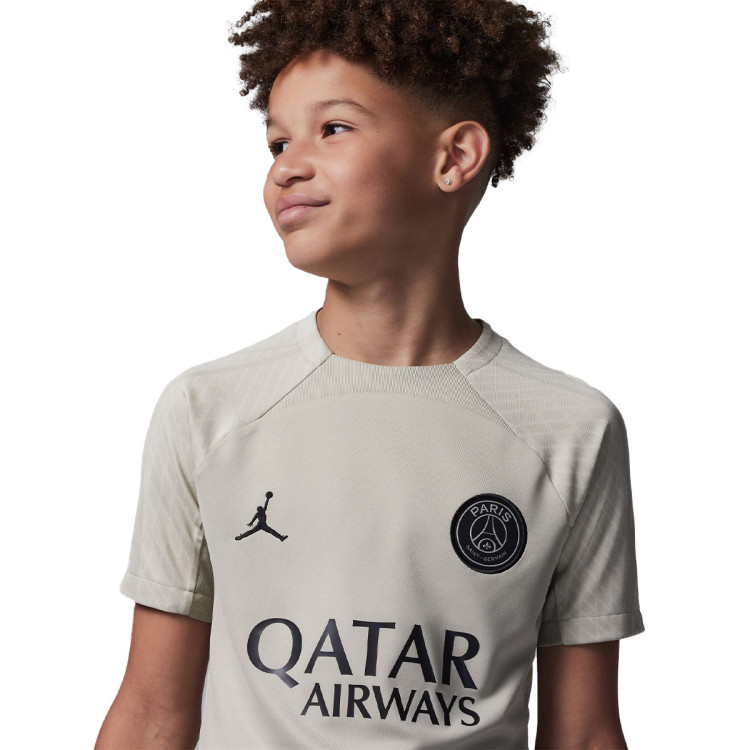 camiseta-jordan-paris-saint-germain-x-jordan-training-2023-2024-nino-stone-stone-iron-grey-black-2