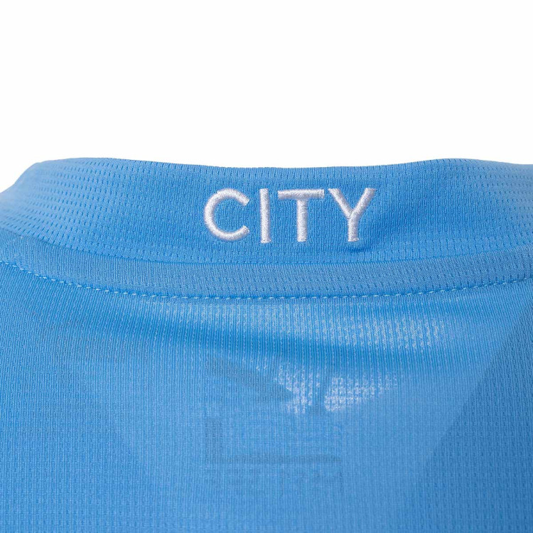 camiseta-puma-manchester-city-primera-equipacion-2023-2024-nino-team-light-blue-white-4.jpg