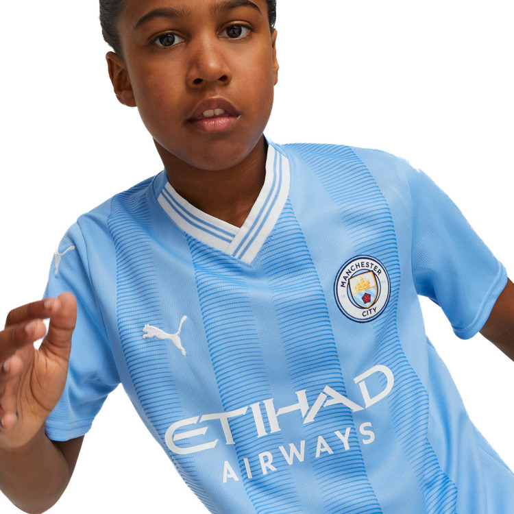 conjunto-puma-manchester-city-primera-equipacion-2023-2024-nino-team-light-blue-white-1.jpg