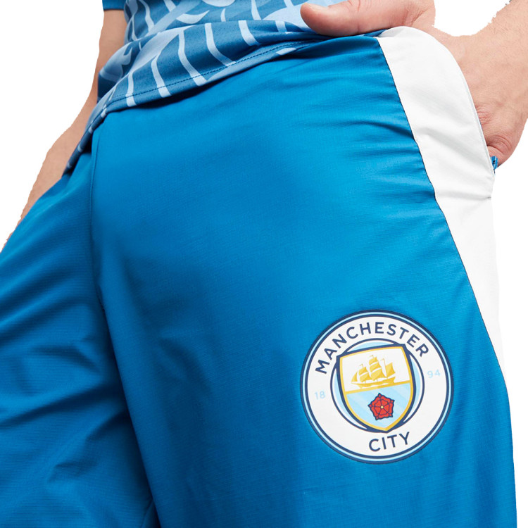 pantalon-largo-puma-manchester-city-pre-match-2023-2024-adulto-lake-blue-puma-white-4