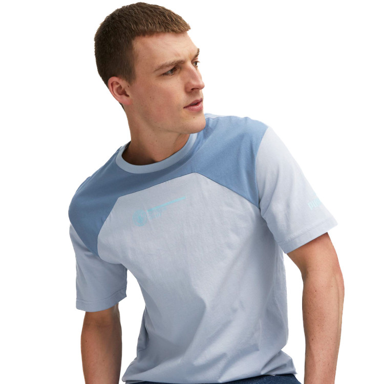 camiseta-puma-manchester-city-fanswear-2023-2024-adulto-blue-wash-deep-dive-2