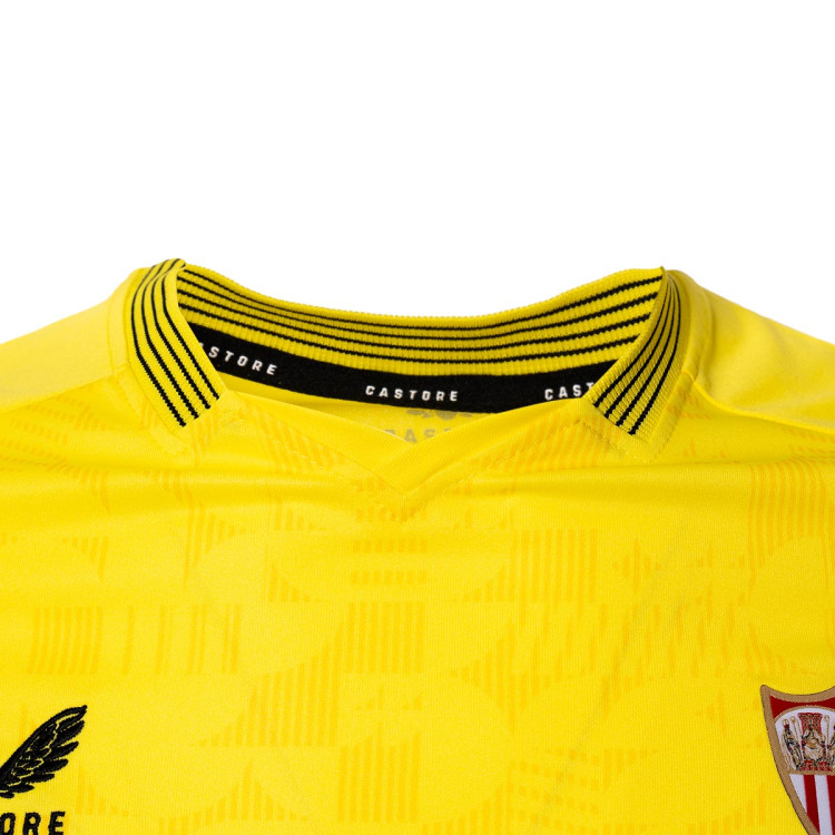camiseta-castore-sevilla-fc-segunda-equipacion-portero-2023-2024-nino-blazing-yellow-black-4.jpg