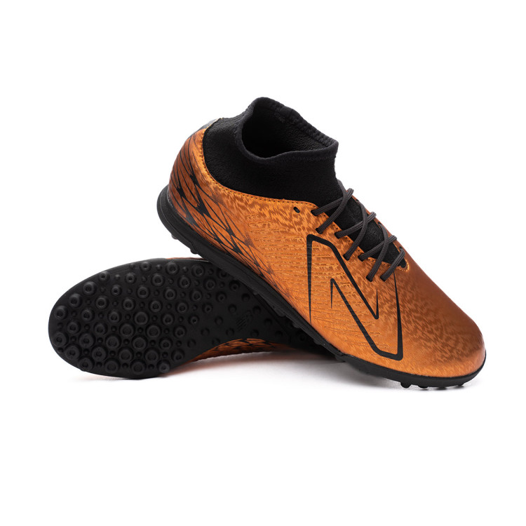 bota-new-balance-tekela-v4-magique-turf-naranja-0.jpg