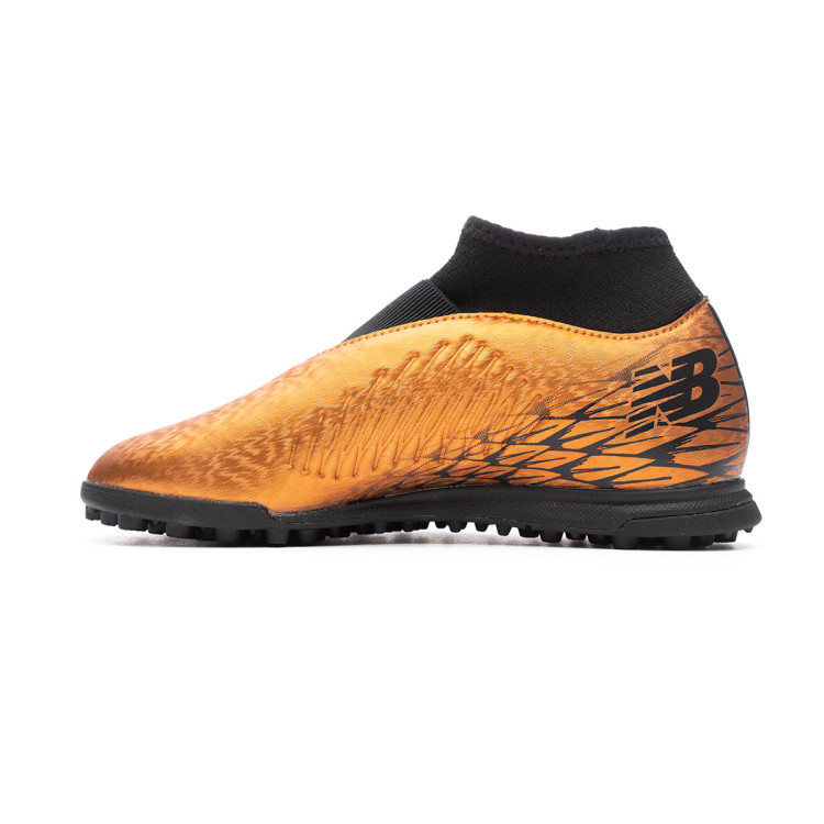 bota-new-balance-tekela-v4-magique-turf-nino-naranja-2.jpg
