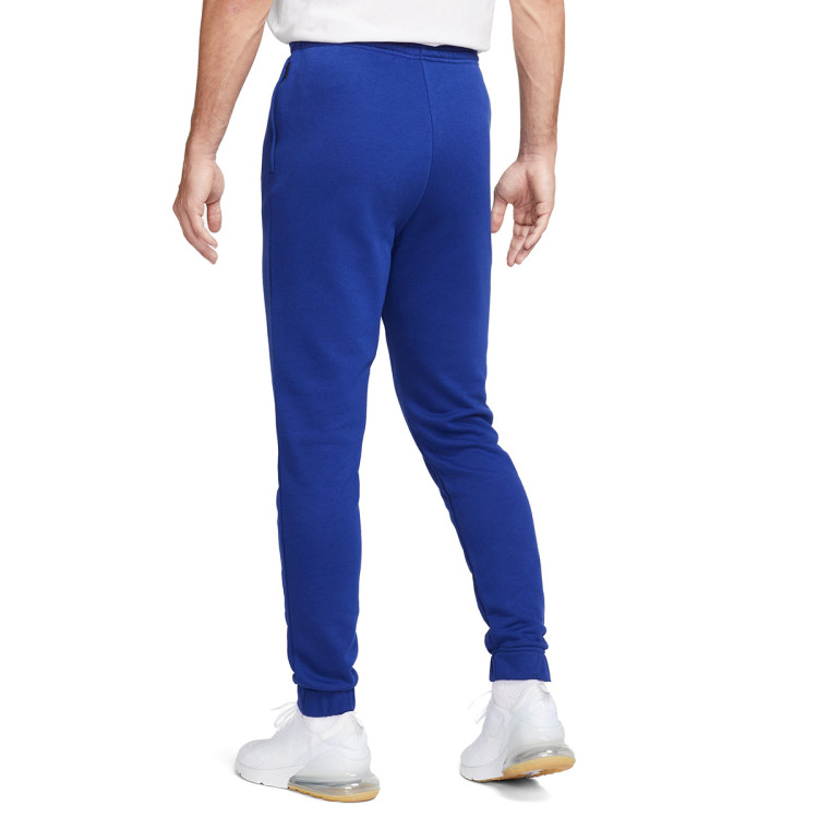 pantalon-largo-nike-fc-barcelona-fanswear-2023-2024-deep-royal-blue-pale-ivory-1