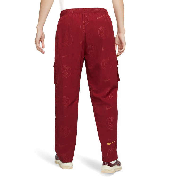 pantalon-largo-nike-paris-saint-germain-fc-fanswear-2023-2024-mujer-team-redgold-suede-no-spon-se-1