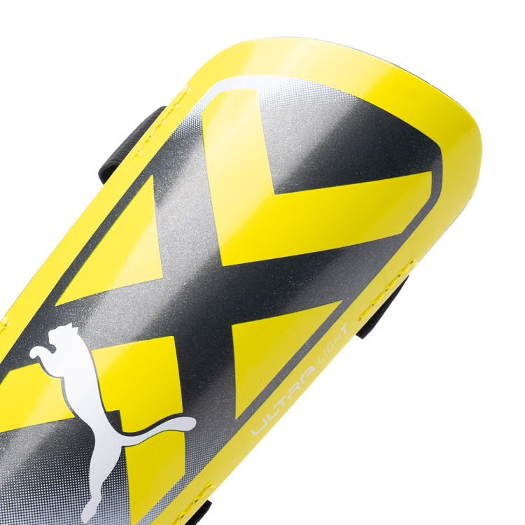 espinillera-puma-ultra-light-strap-yellow-blaze-black-1