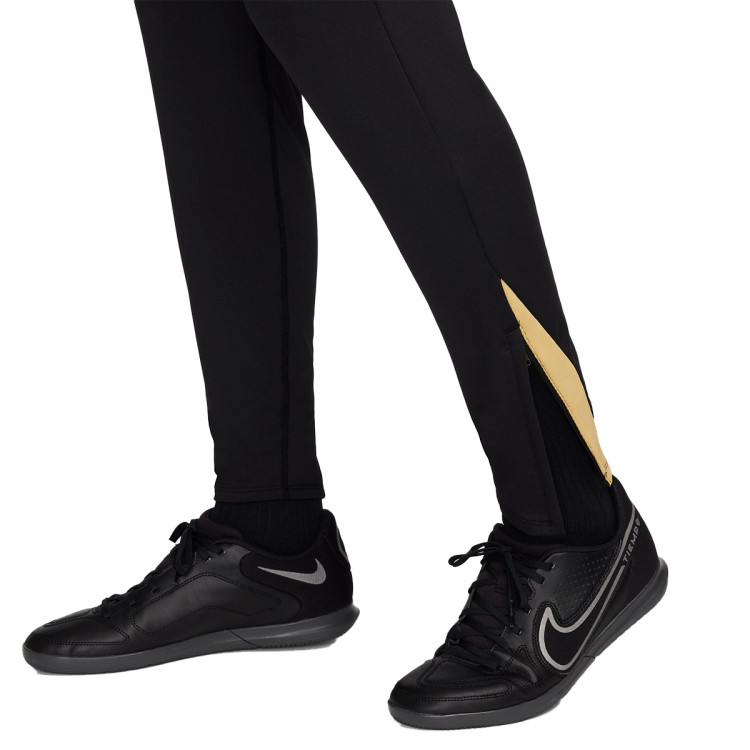 pantalon-largo-nike-dri-fit-strike-mujer-black-jersey-gold-metallic-gold-4
