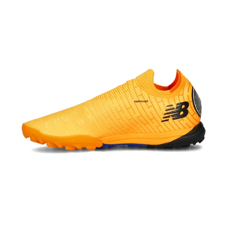 bota-new-balance-furon-pro-turf-v7-sun-glow-silver-metallic-black-2
