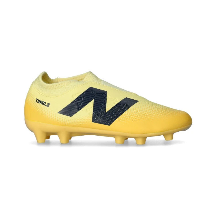 bota-new-balance-tekela-magique-fg-v4-nino-naranja-1