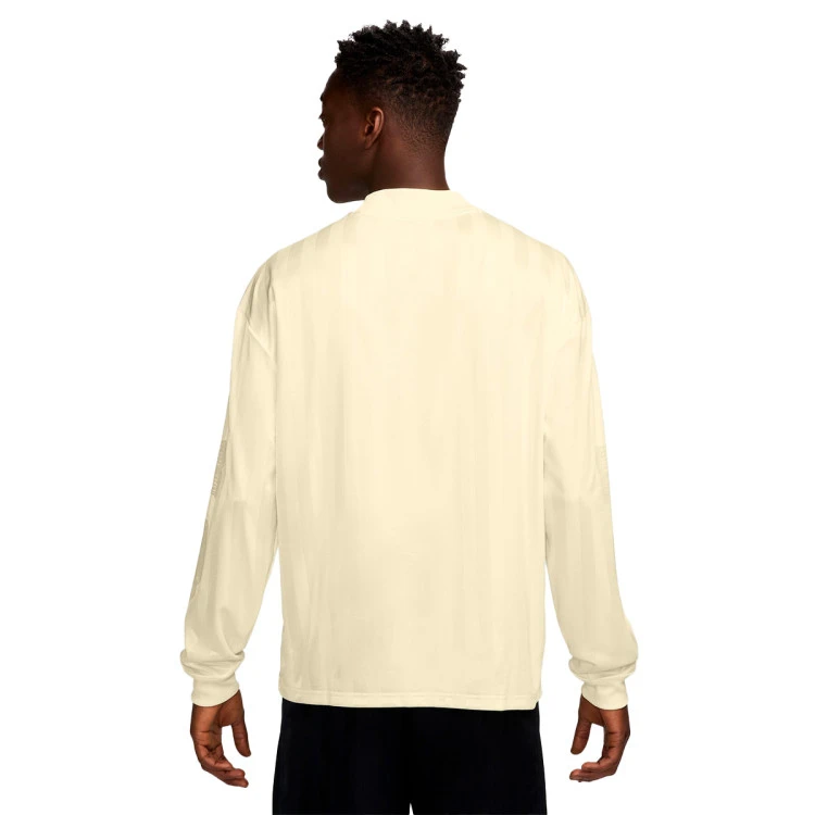 sudadera-nike-liverpool-fc-fanswear-2025-2026-coconut-milk-gym-red-no-spon-se-1