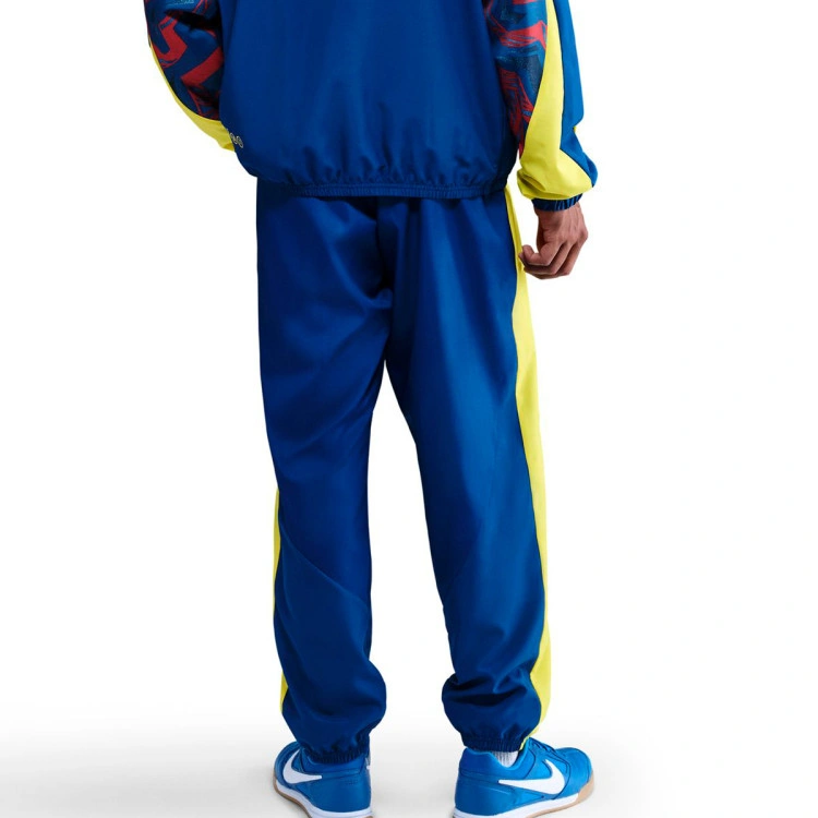 pantalon-largo-nike-fc-barcelona-fanswear-2025-2026-gym-blue-opti-yellow-opti-yellow-no-spons-se-1