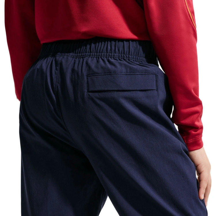 pantalon-largo-nike-fc-barcelona-fanswear-2026-2027-nino-blackened-blue-black-mineral-yellow-no-sponso-1