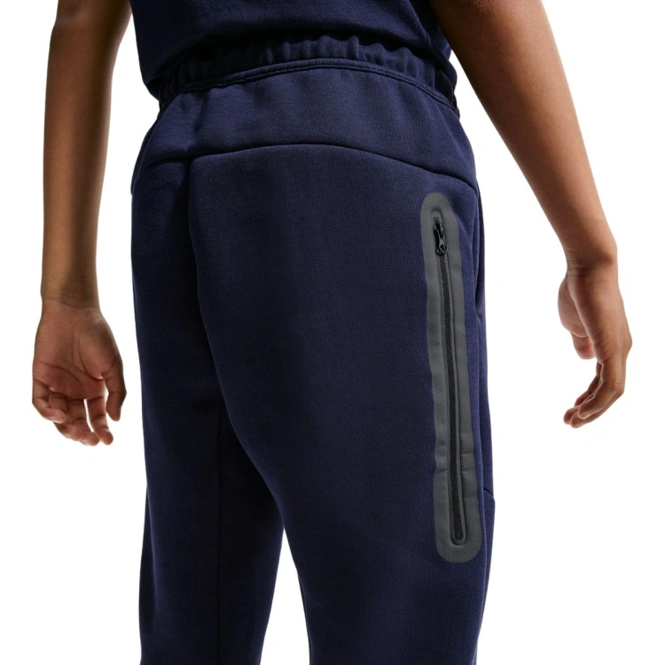 pantalon-largo-nike-fc-barcelona-fanswear-2026-2027-nino-black-loyal-blue-dusty-cactus-university-gold-1