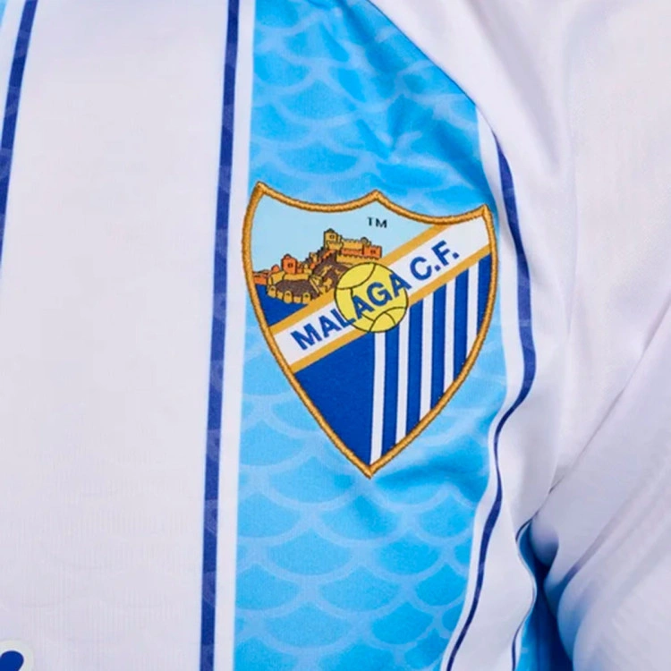 camiseta-hummel-malaga-cf-primera-equipacion-2026-2027-little-boy-blue-4