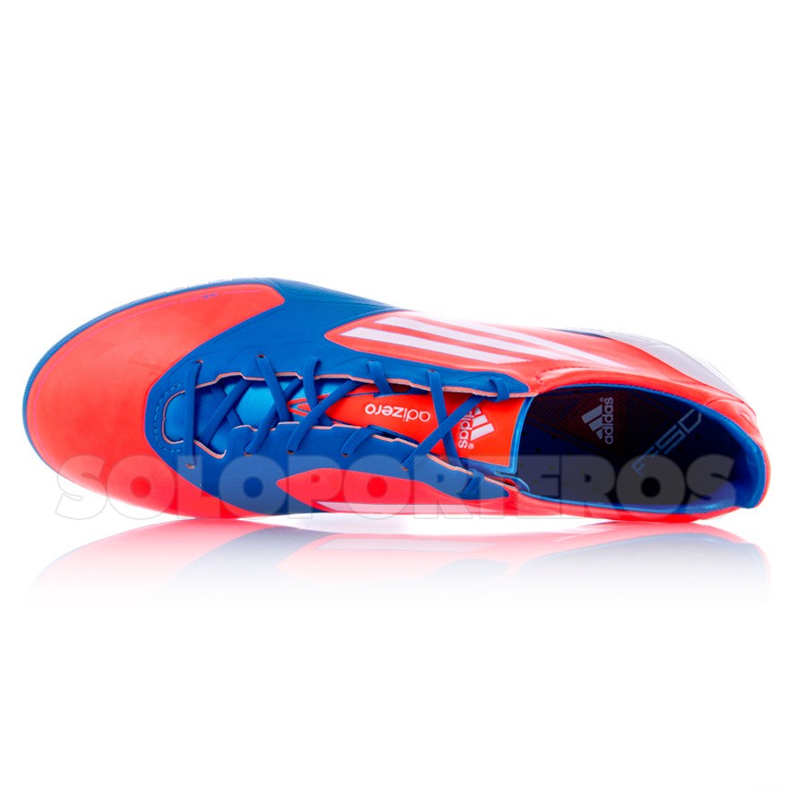 tenis adidas naranjas de futbol