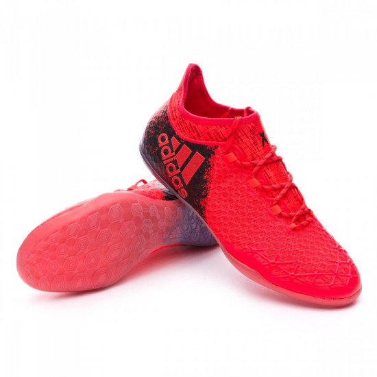 Zapatillas de futbol sala para Niño de color rojo y azul