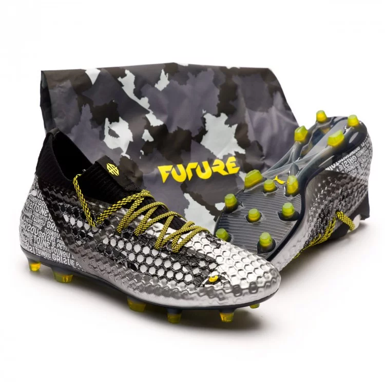 post card bota-puma-future-18.1-netfit-grizi-fg-puma-black-puma-silver-vibrant-yellow-0_0.webp